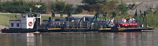 A picture of cars on the ferry.